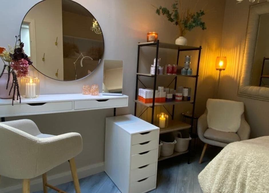 Relaxing treatment room at Glow by Siobhan, The Gym, Dublin, County Dublin, IE, with cozy seating and elegant decor.