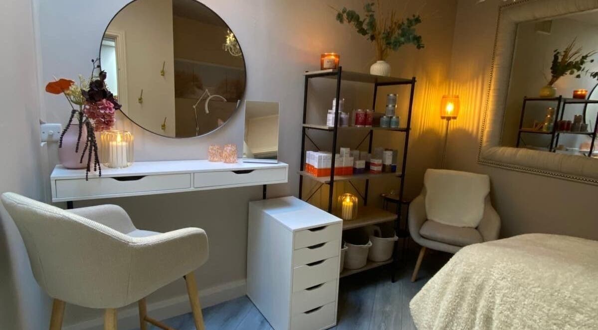 Relaxing treatment room at Glow by Siobhan, The Gym, Dublin, County Dublin, IE, with cozy seating and elegant decor.