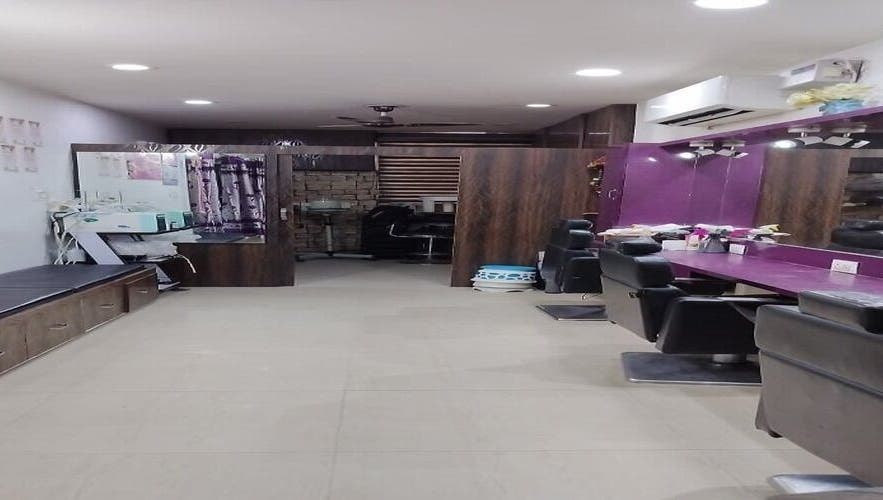 AHORA LUX salon interior with stylish chairs and lighting in Ludhiana, Punjab, IN.