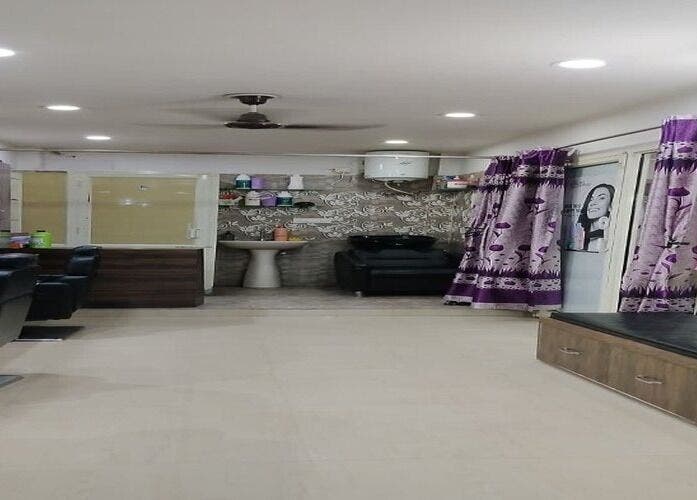 Modern interior of AHORA LUX beauty salon in Ludhiana, Punjab, IN with elegant furnishings and styling seats.
