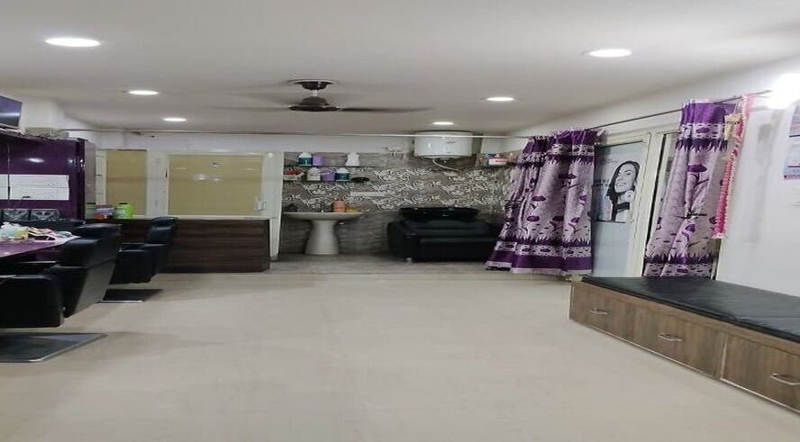 Modern interior of AHORA LUX beauty salon in Ludhiana, Punjab, IN with elegant furnishings and styling seats.