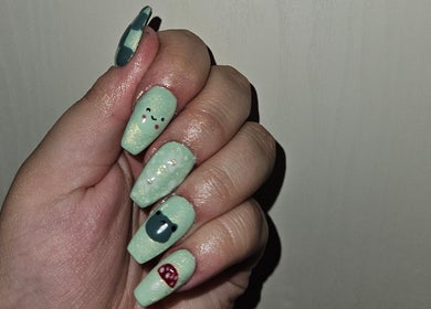 Mint green whimsical nail art at Enchanted Tips, Kempton Park, Gauteng, ZA.