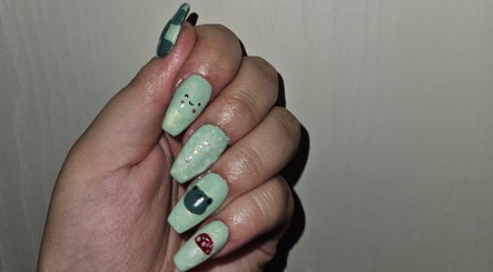 Mint green whimsical nail art at Enchanted Tips, Kempton Park, Gauteng, ZA.