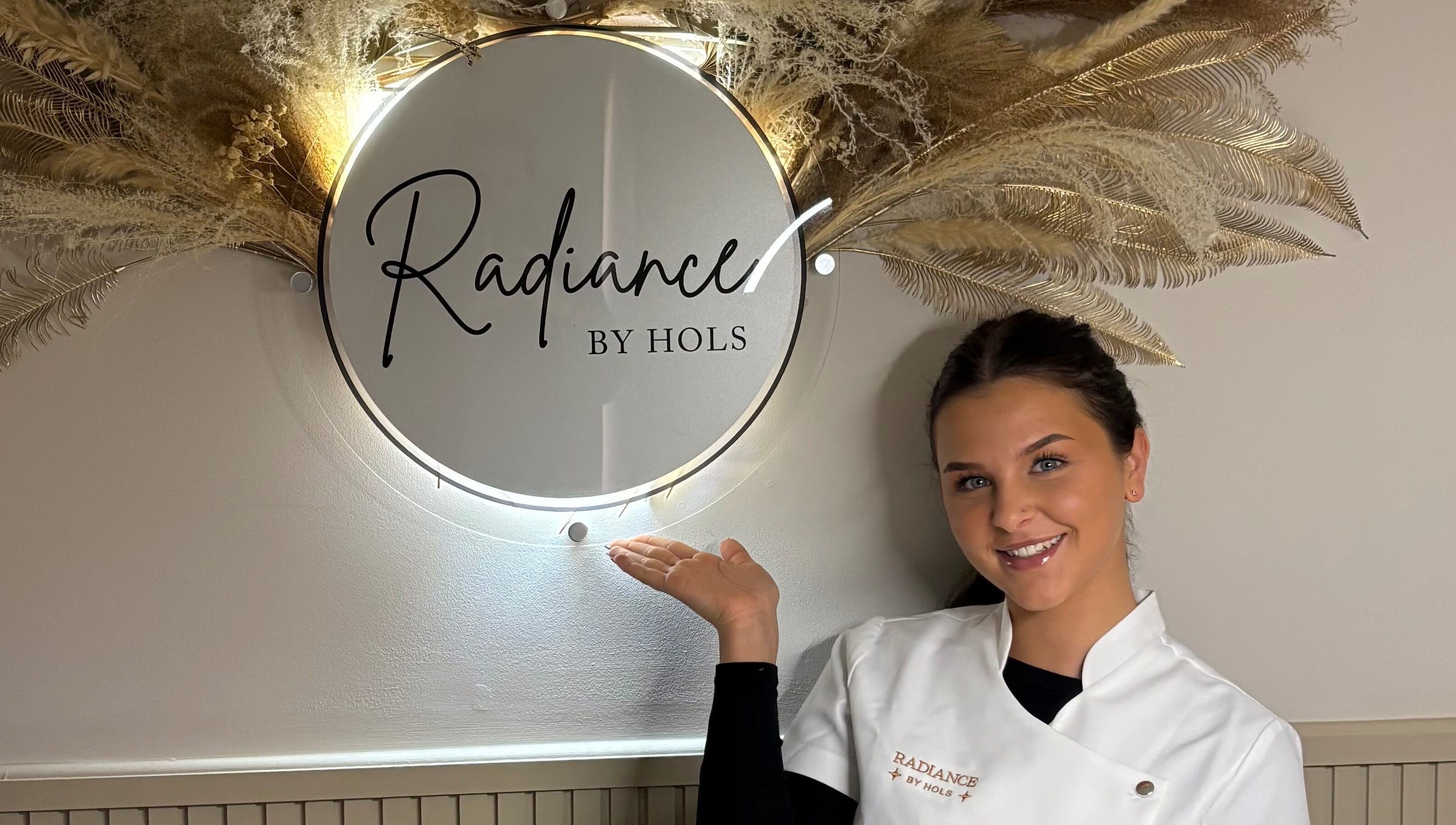 Professional at Radiancebyhols, Kidderminster, England showcasing elegant salon decor.