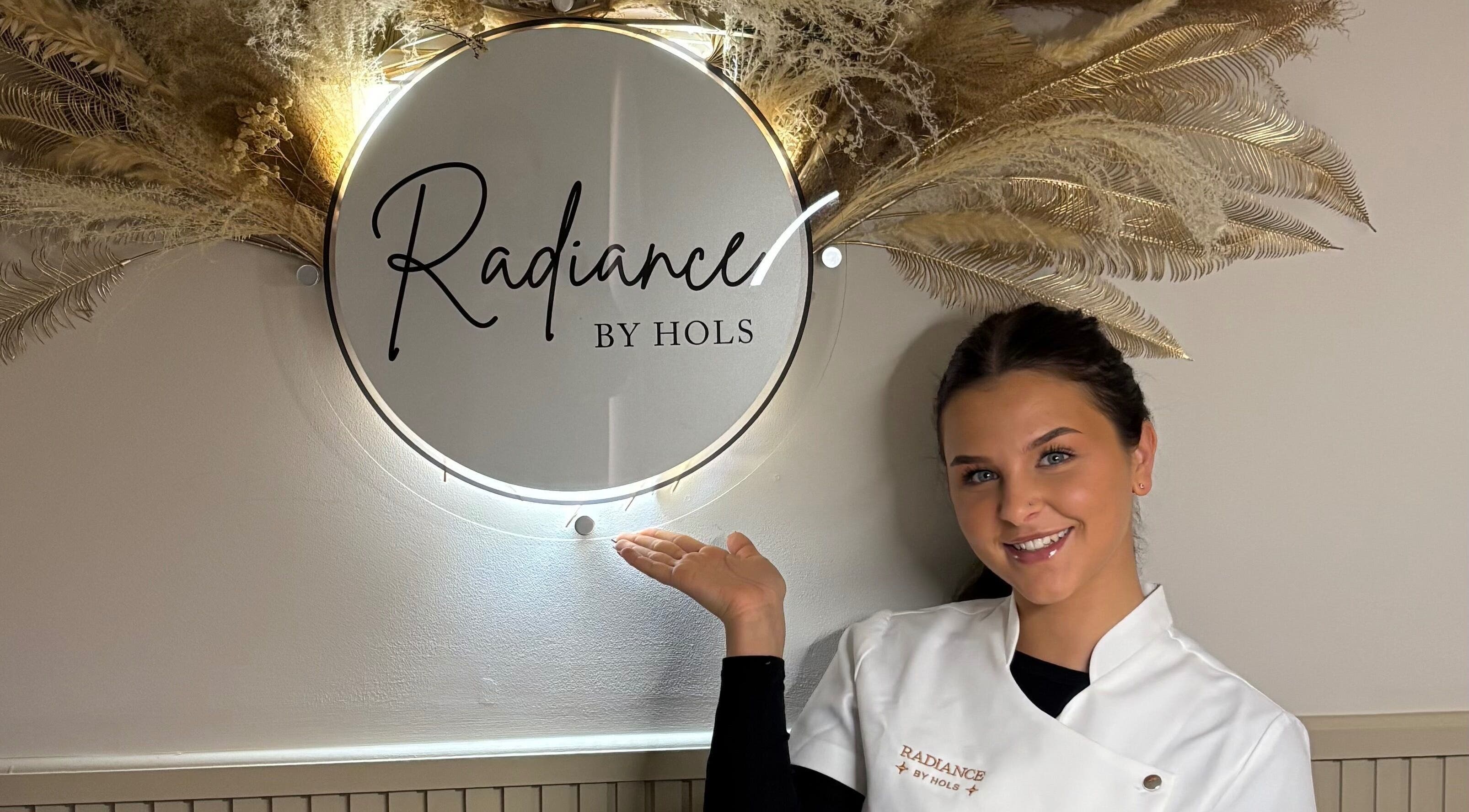 Professional at Radiancebyhols, Kidderminster, England showcasing elegant salon decor.