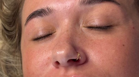 Close-up of peaceful face with closed eyes at Smooth Aesthetics, Glasgow, Scotland, GB.