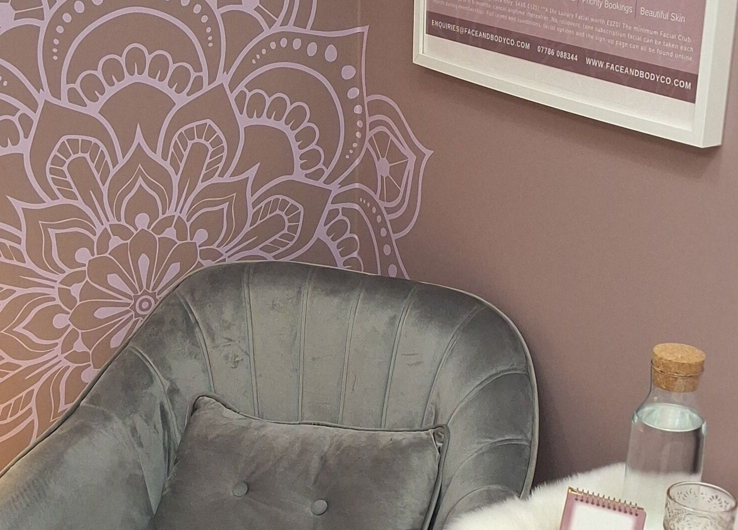 Cozy chair in relaxing corner at THE FACE AND BODY COMPANY BEAUTY & AESTHETICS, Haywards Heath, England, GB.