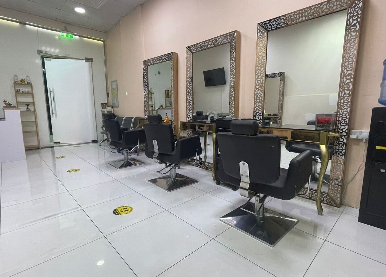 Chic interior of Sparkles N Charms Womens Beauty Salon in Dubai, AE with elegant styling stations.
