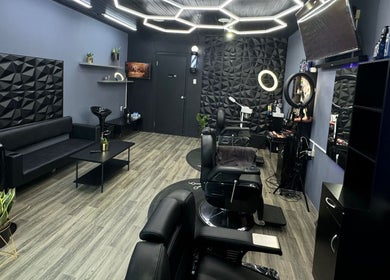 Modern interior of Gentlemen Barbershop & Hairstyling, Willemstad, Curaçao, CW, featuring sleek design and chic decor.