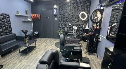 Modern interior of Gentlemen Barbershop & Hairstyling, Willemstad, Curaçao, CW showcasing stylish chairs and decor.