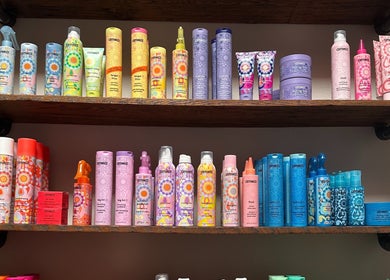 Vibrant Amika hair products on display at Elevate Hair Studio in De Pere, WI, US.