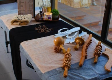 Relaxing setup with spa tools and slippers at ORA10 SPA - Home Service, Riyadh, Riyadh Province, SA.