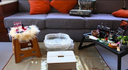 ORA10 SPA - Home Service in Riyadh, Riyadh Province, SA offers a cozy spa setup with manicure and relaxation tools.