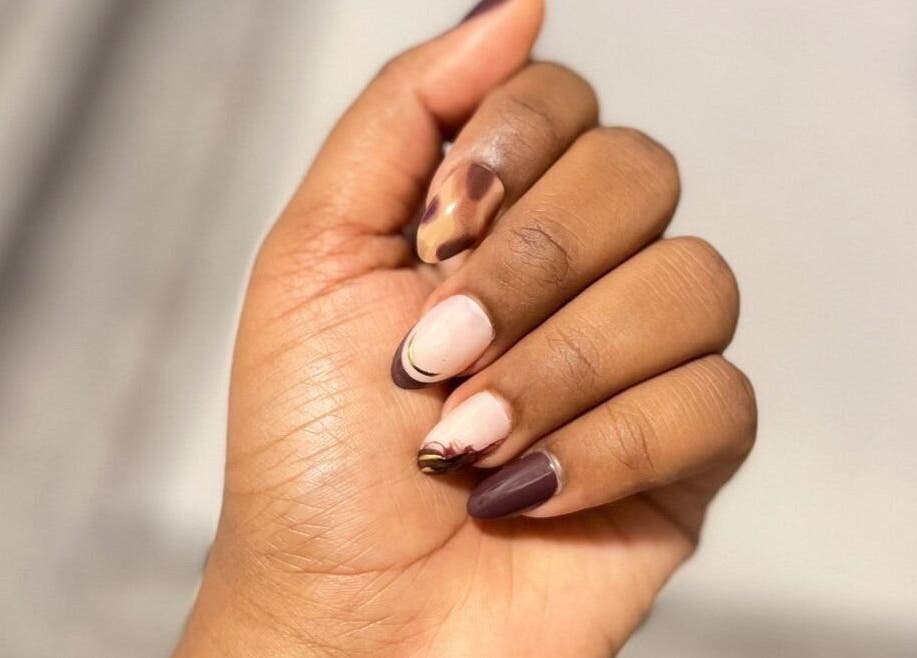 Stylish manicure at ORA10 SPA - Home Service in Riyadh, Riyadh Province, SA showcasing detailed nail art.