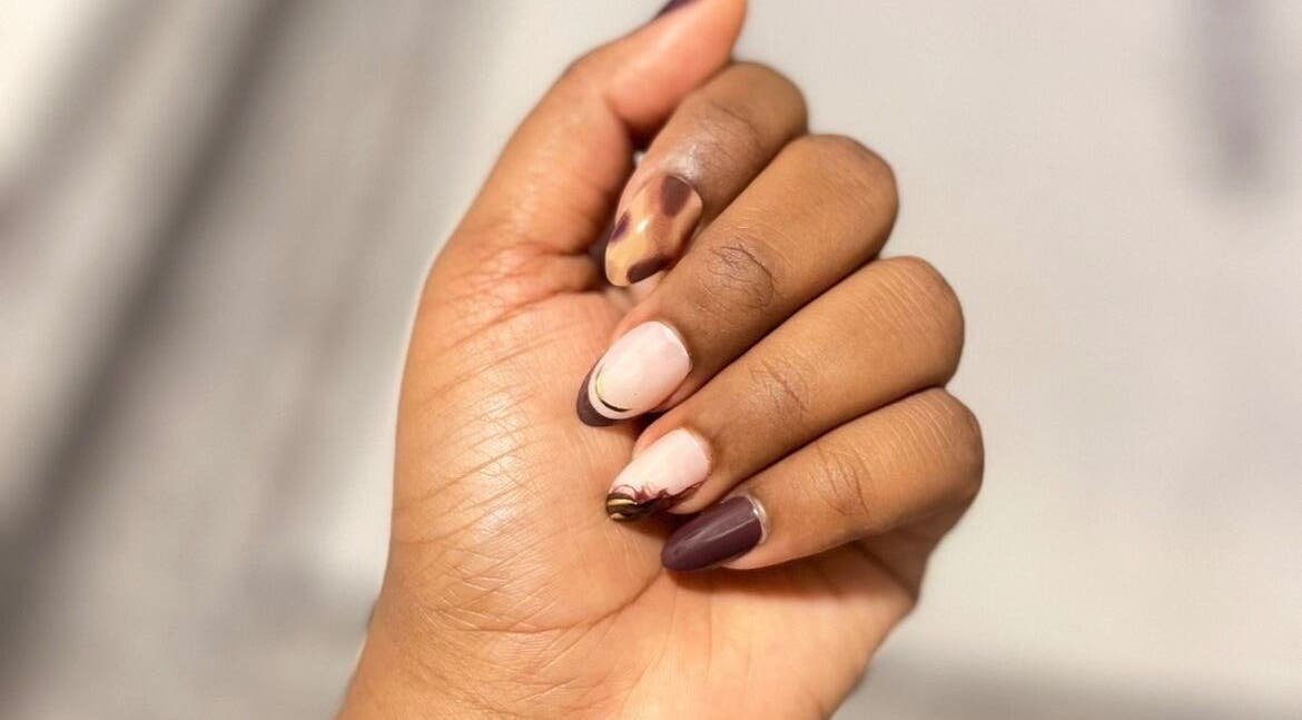 Stylish manicure at ORA10 SPA - Home Service in Riyadh, Riyadh Province, SA showcasing detailed nail art.