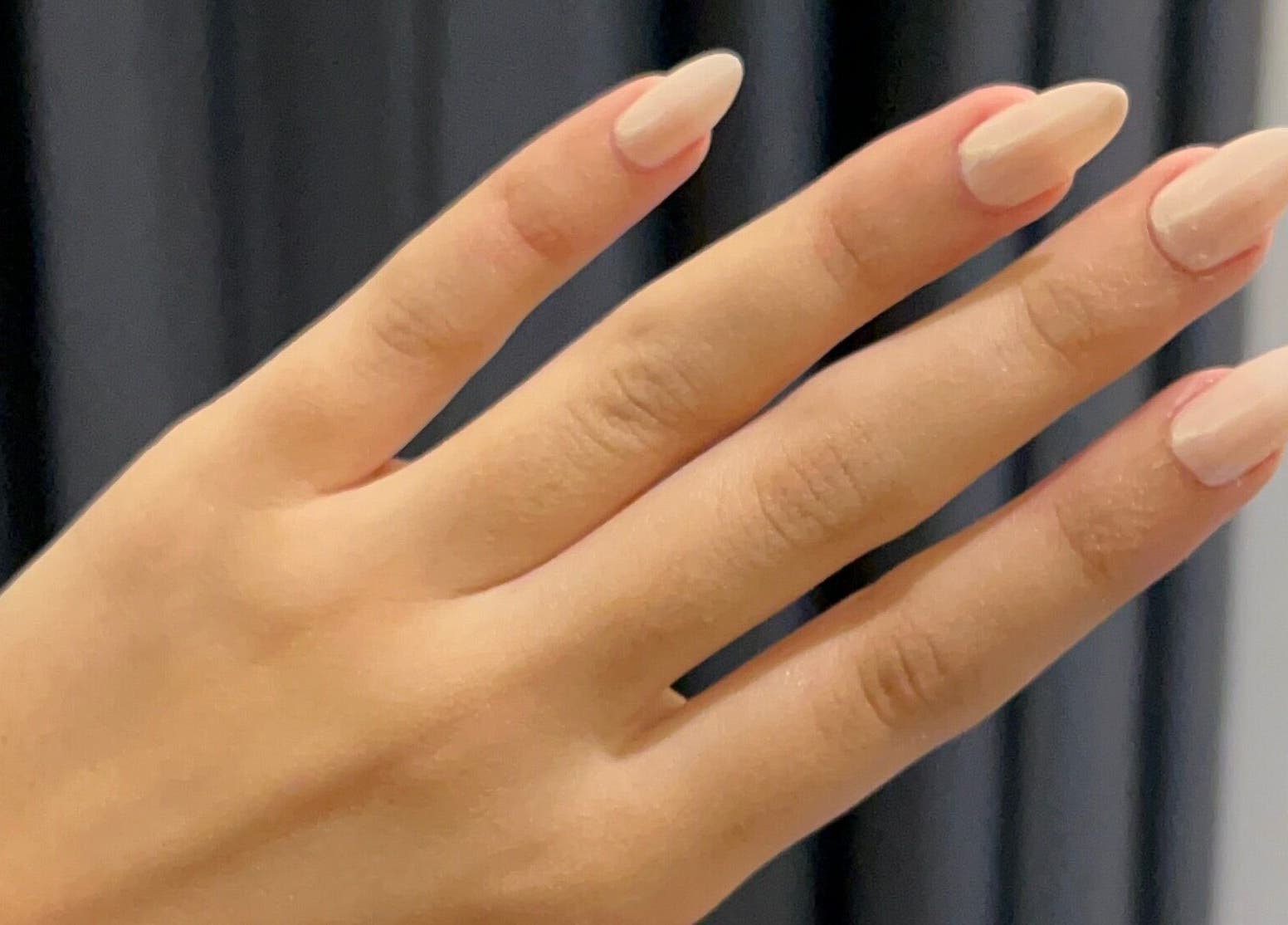 Manicured hand with nude nails by ORA10 SPA - Home Service, Riyadh, Riyadh Province, SA.