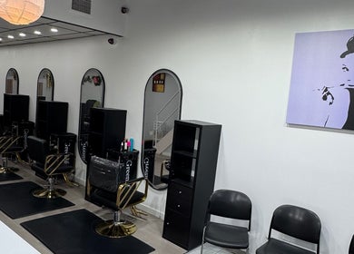 Interior of Olafol Centre De Beauté in Montréal, Québec, CA, featuring modern salon stations and mirrors.