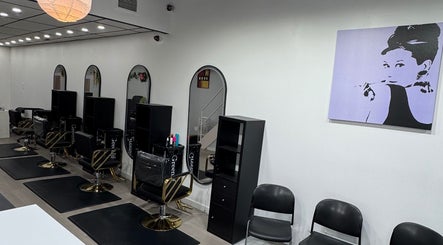 Interior of Olafol Centre De Beauté in Montréal, Québec, CA, featuring modern salon stations and mirrors.