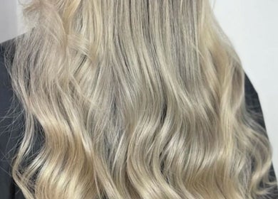 Flowing blonde hair styled at Olafol Centre De Beauté, Montréal, Québec, CA.