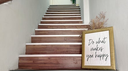 Elegant wooden stairs with motivational art at The Glam Bar - Tampines, Singapore, Singapore, SG.