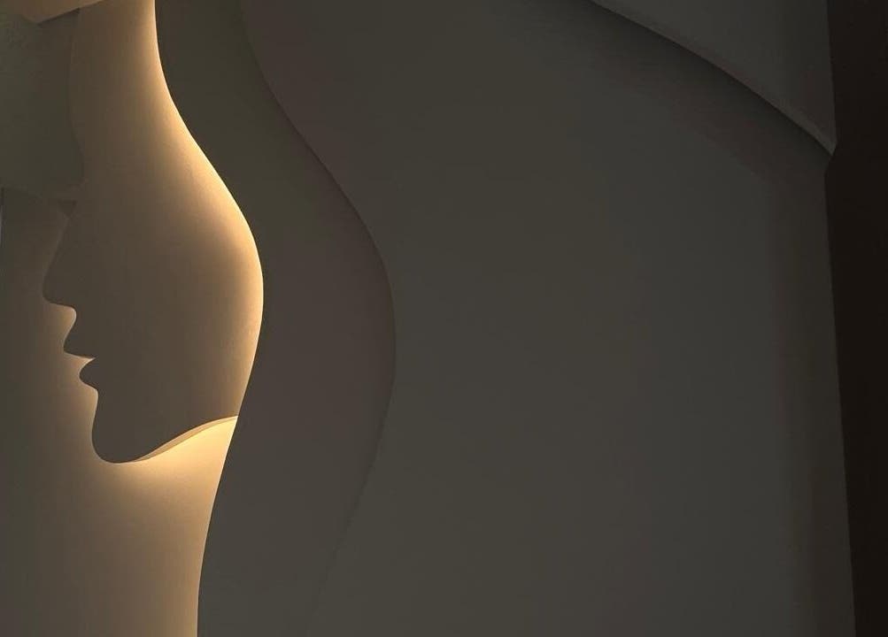 Elegant silhouette feature wall at Blend Spa, Sharjah, AE, showcasing modern design and serene ambiance.