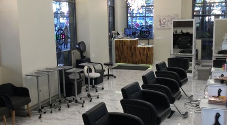 Sleek interior of Amazing Hair Salon in New York, New York, US, with stylish chairs and modern decor.