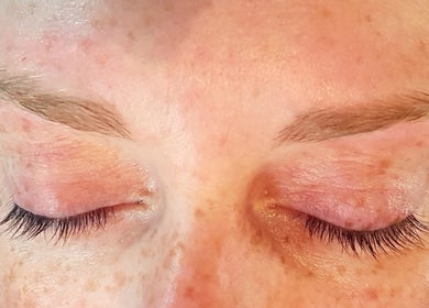 Close-up of eyelash extension treatment at PureGlow Therapy, New Addington, England, GB.