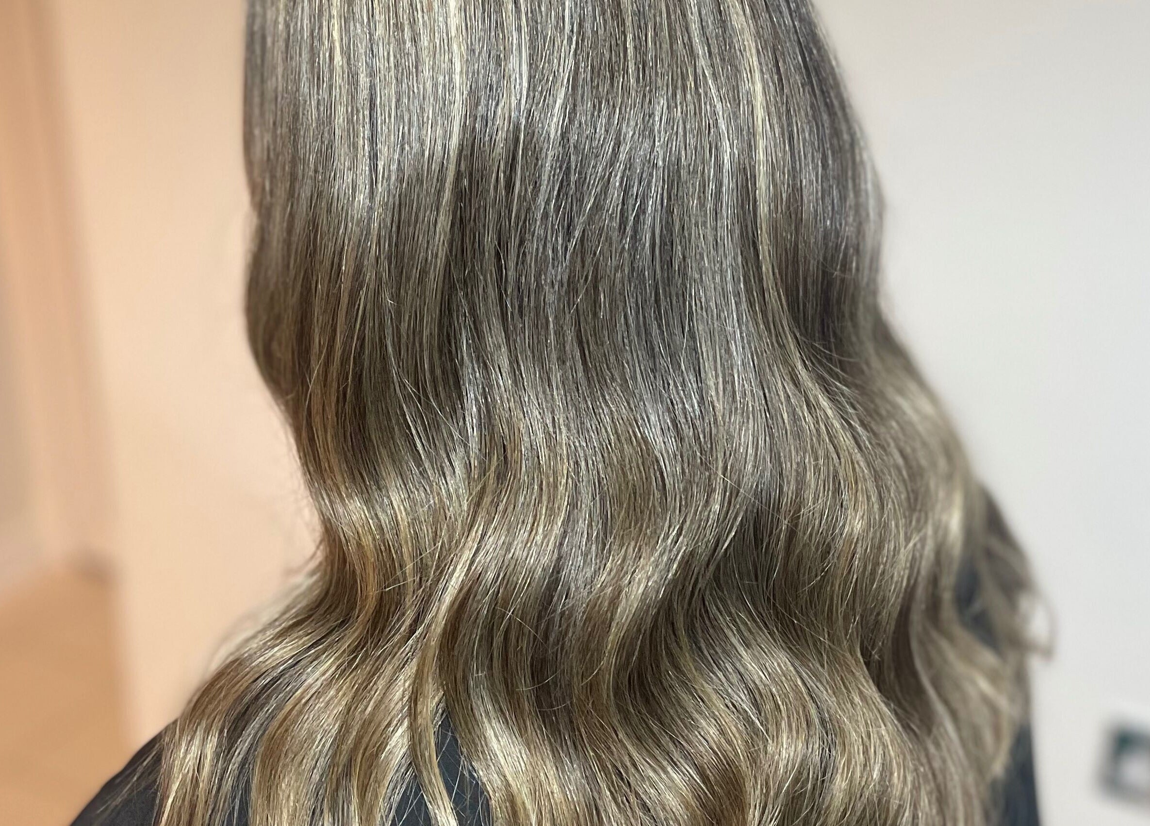 Glossy, styled waves by Dala Hair Salon Ammanford, located in Ammanford, Wales, GB.