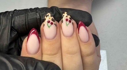 Cherry and red nail art at Pearlfect Beauty in Widley, England, GB.