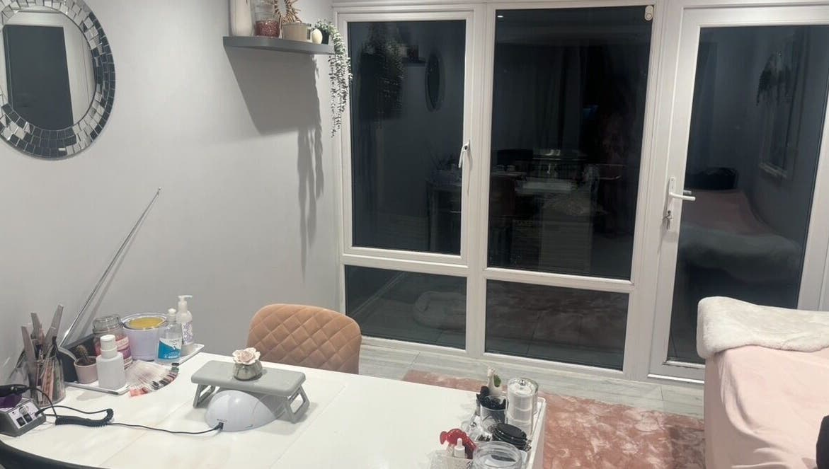 Peaceful treatment room at Pearlfect Beauty, Widley, England, GB with cozy decor and natural lighting.