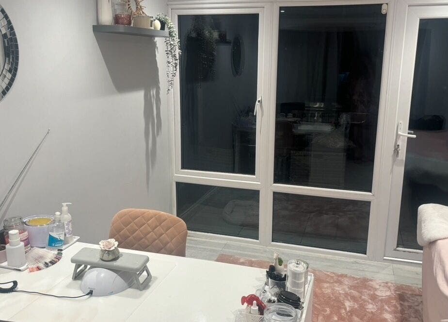 Peaceful treatment room at Pearlfect Beauty, Widley, England, GB with cozy decor and natural lighting.