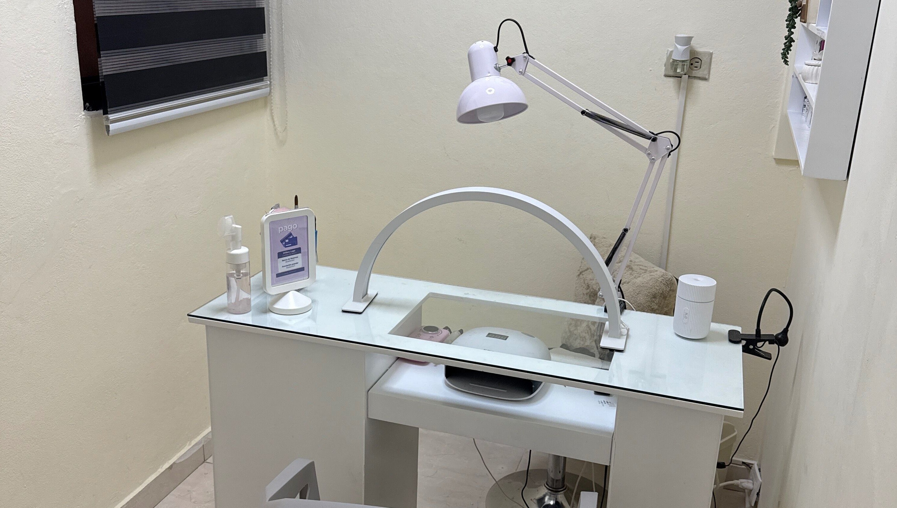 Modern nail station at Nails by Wila, Santo Domingo, Santo Domingo, DO featuring sleek design and white decor.