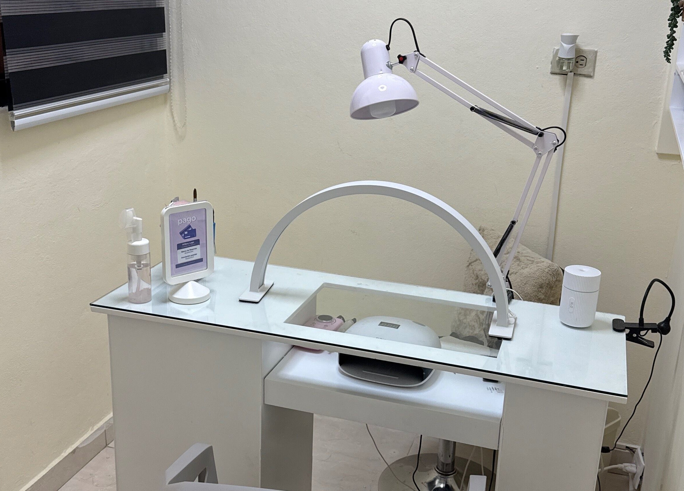Modern nail station at Nails by Wila, Santo Domingo, Santo Domingo, DO featuring sleek design and white decor.