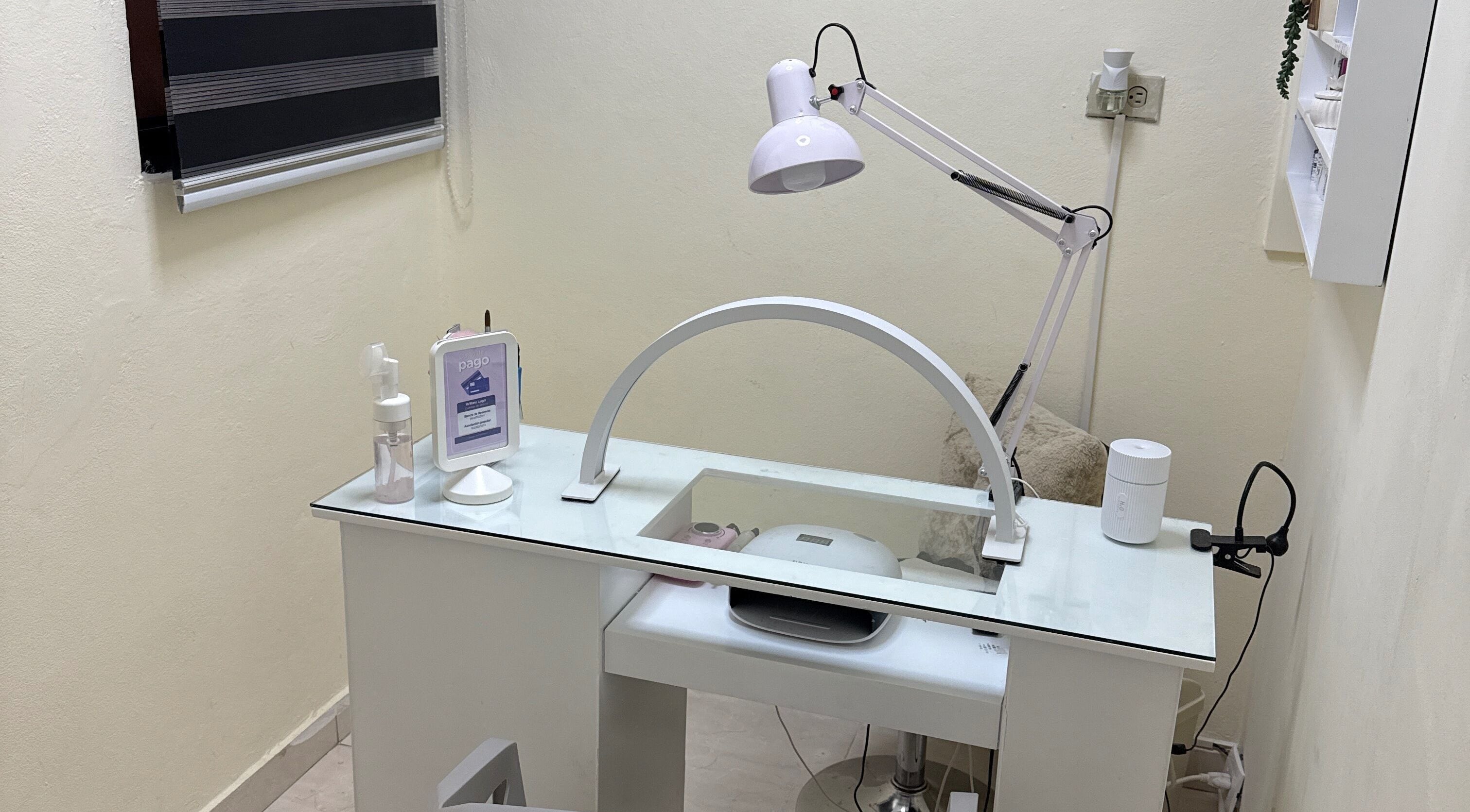 Modern nail station at Nails by Wila, Santo Domingo, Santo Domingo, DO featuring sleek design and white decor.
