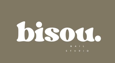 Bisou Studio logo on taupe background, Manchester, England, GB. Stylish and minimalistic design.