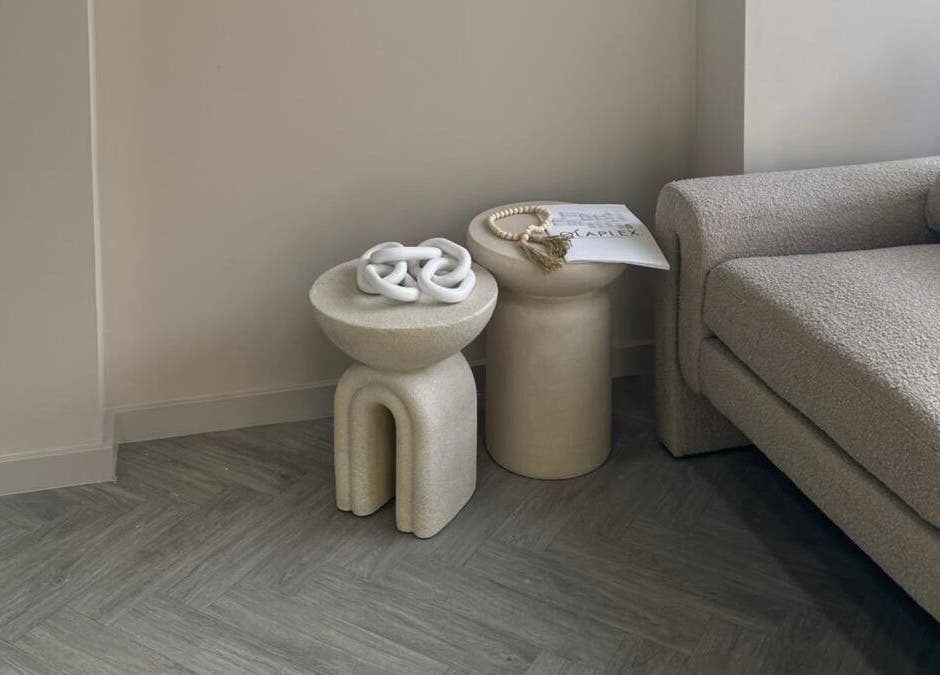 Modern cozy seating area at Bisou Nail Studio, Manchester, England, GB, with chic furniture design.