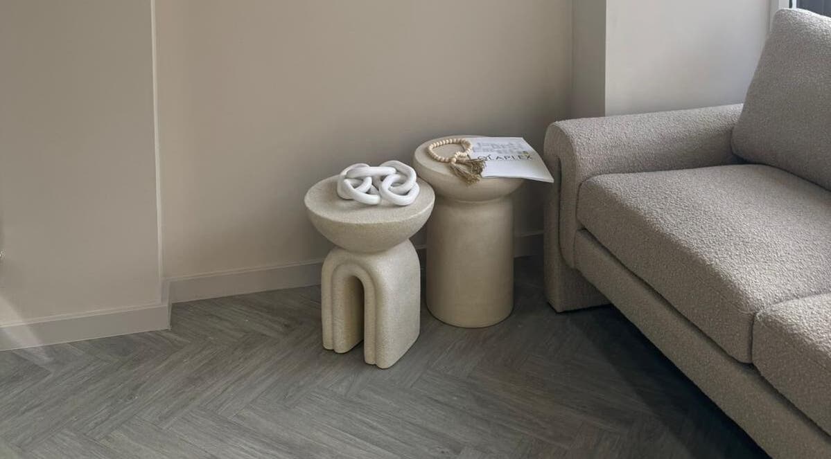 Modern cozy seating area at Bisou Nail Studio, Manchester, England, GB, with chic furniture design.