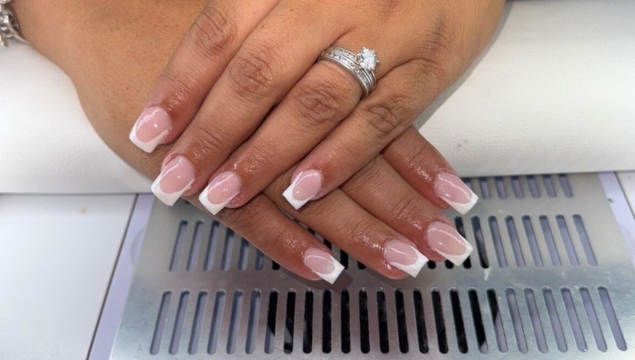 Beautiful French manicure at houseofnailsbydem in Stockton-on-tees, England, GB, showcasing elegant nail design.