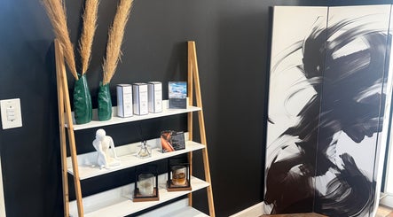 Elegant shelf display with art at Empire Nails and Beauty Studio, Sandton, Gauteng, ZA.