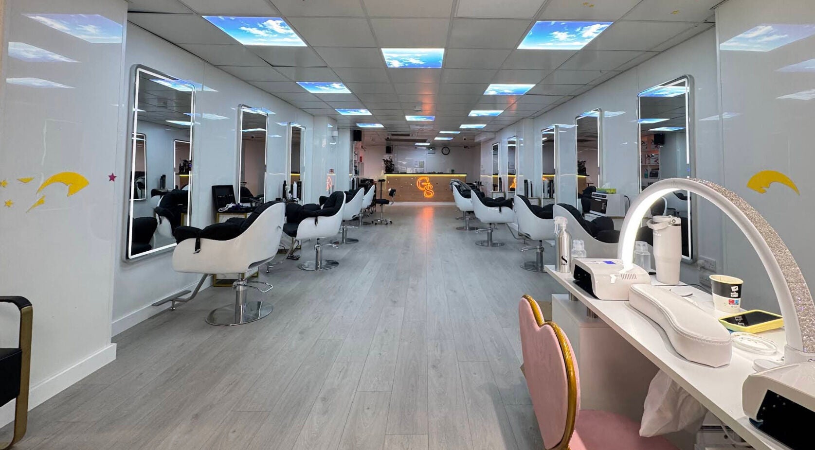 Modern interior of GS Hair&Nail Salon in Dublin, County Dublin, IE, with sleek styling chairs and mirrors.