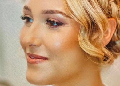 Elegant woman with styled hair at Beauty Couture & Aesthetic Salon, Leicester, England, GB.
