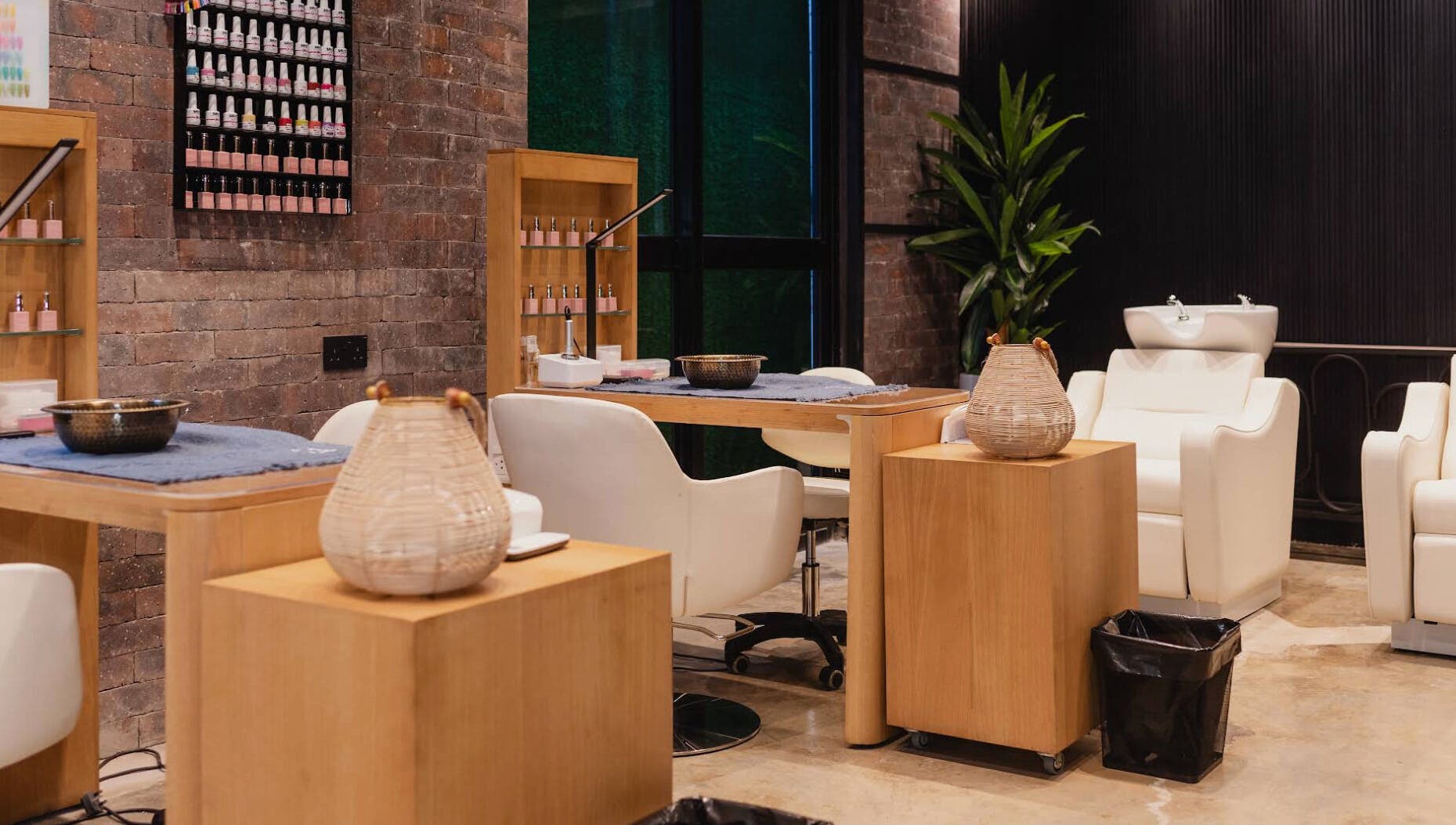 Elegant nail salon at The Spa at Cargo 88 in Lusaka, Lusaka Province, ZM with plush chairs and well-lit decor.