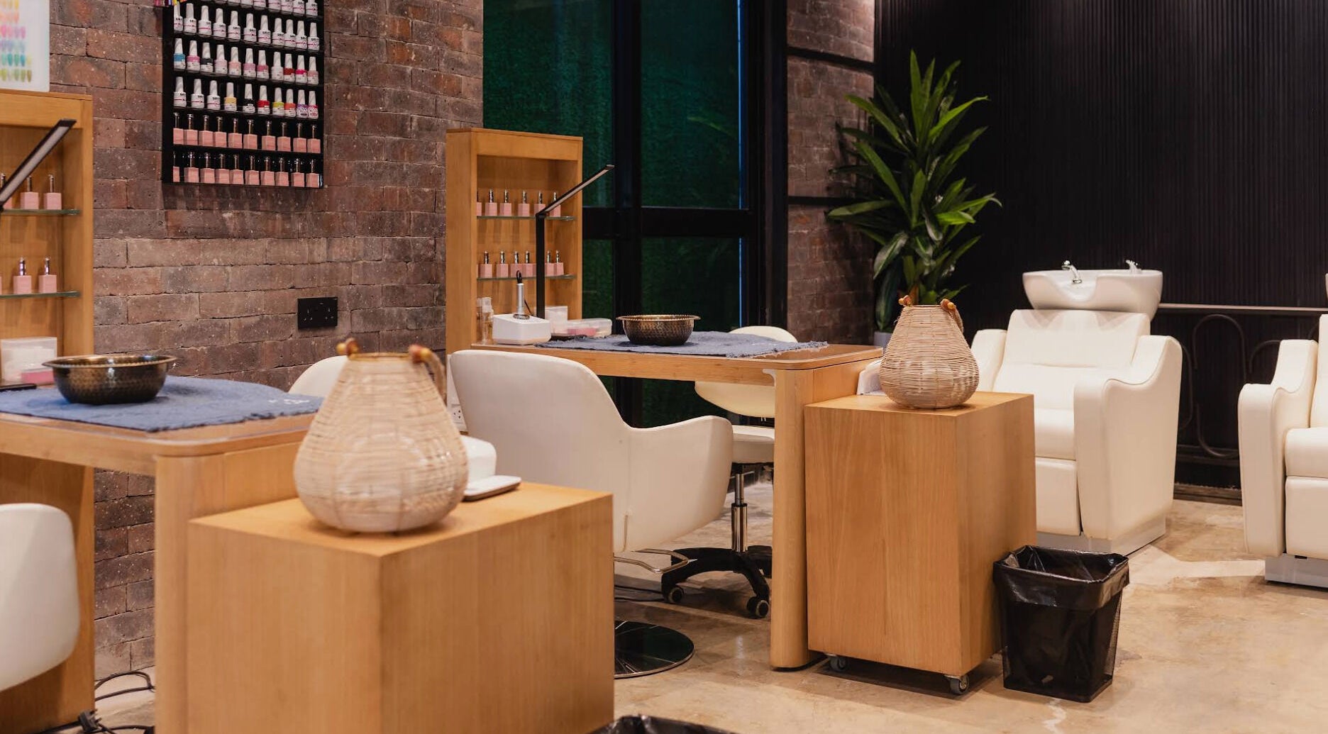 Elegant nail salon at The Spa at Cargo 88 in Lusaka, Lusaka Province, ZM with plush chairs and well-lit decor.