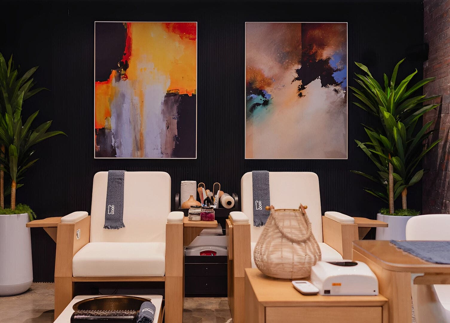 Relaxing lounge at The Spa at Cargo 88, Lusaka. Modern chairs and art enhance the calming ambiance.