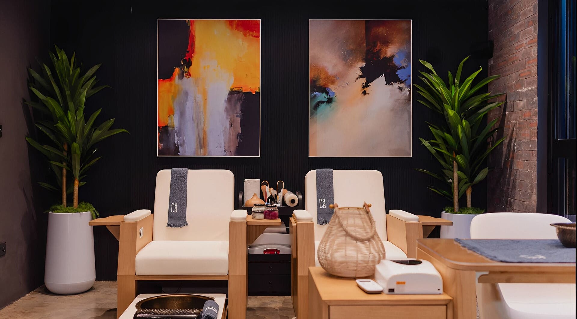 Relaxing lounge at The Spa at Cargo 88, Lusaka. Modern chairs and art enhance the calming ambiance.