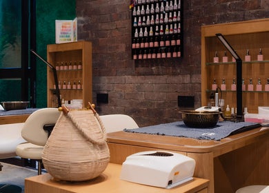 Nail care station at The Spa at Cargo 88, Lusaka, Lusaka Province, ZM, featuring stylish chairs and polish display.