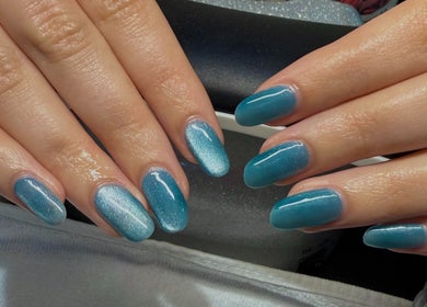 Elegant aqua blue manicure at Barepolish, Sterling, Virginia, US. Perfect glossy finish and nail care.
