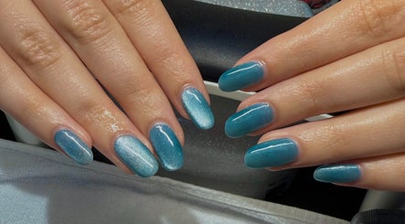 Elegant aqua blue manicure at Barepolish, Sterling, Virginia, US. Perfect glossy finish and nail care.