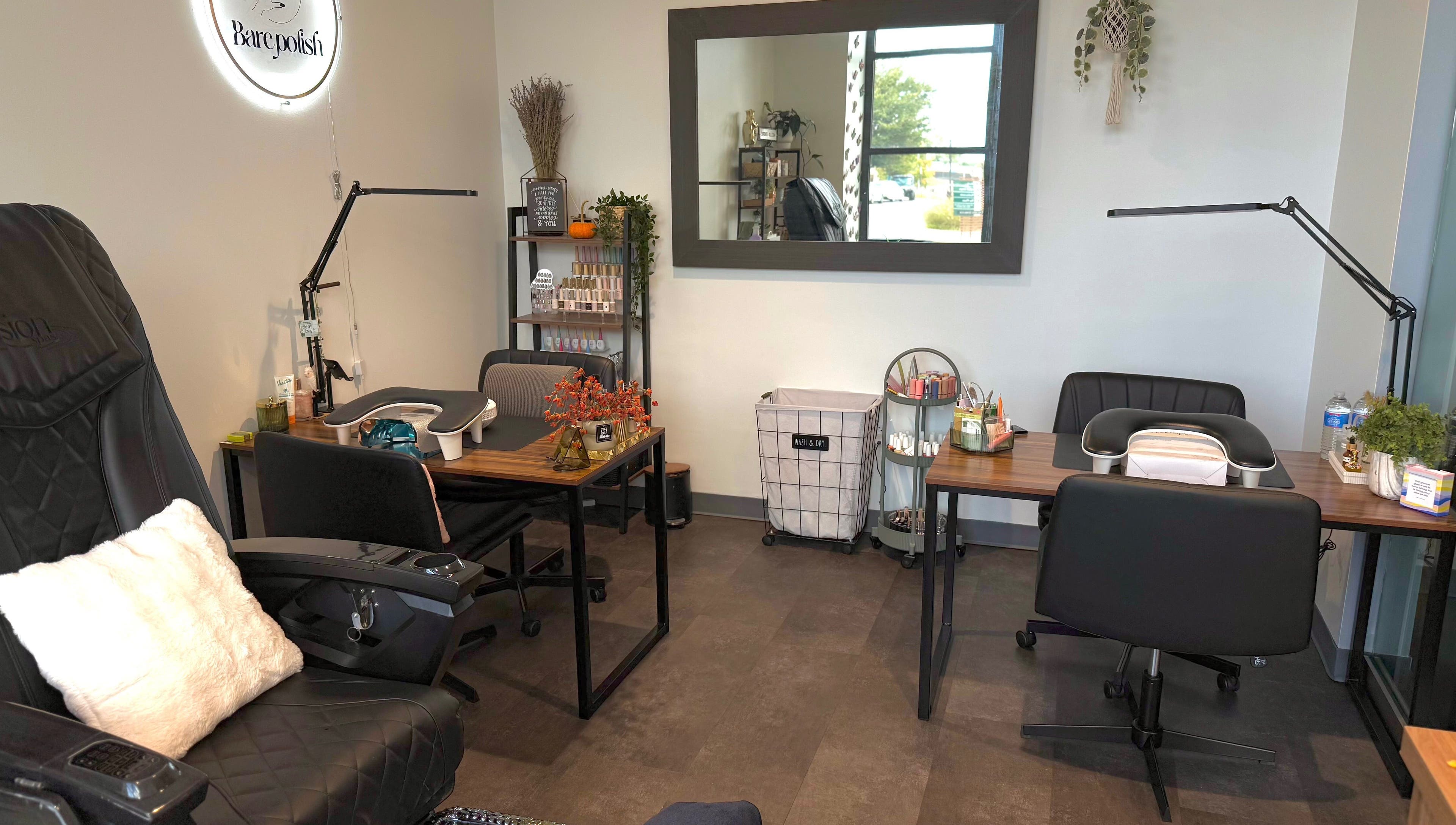Stylish salon setup at Barepolish, Sterling, Virginia, US with modern decor and comfortable seating.