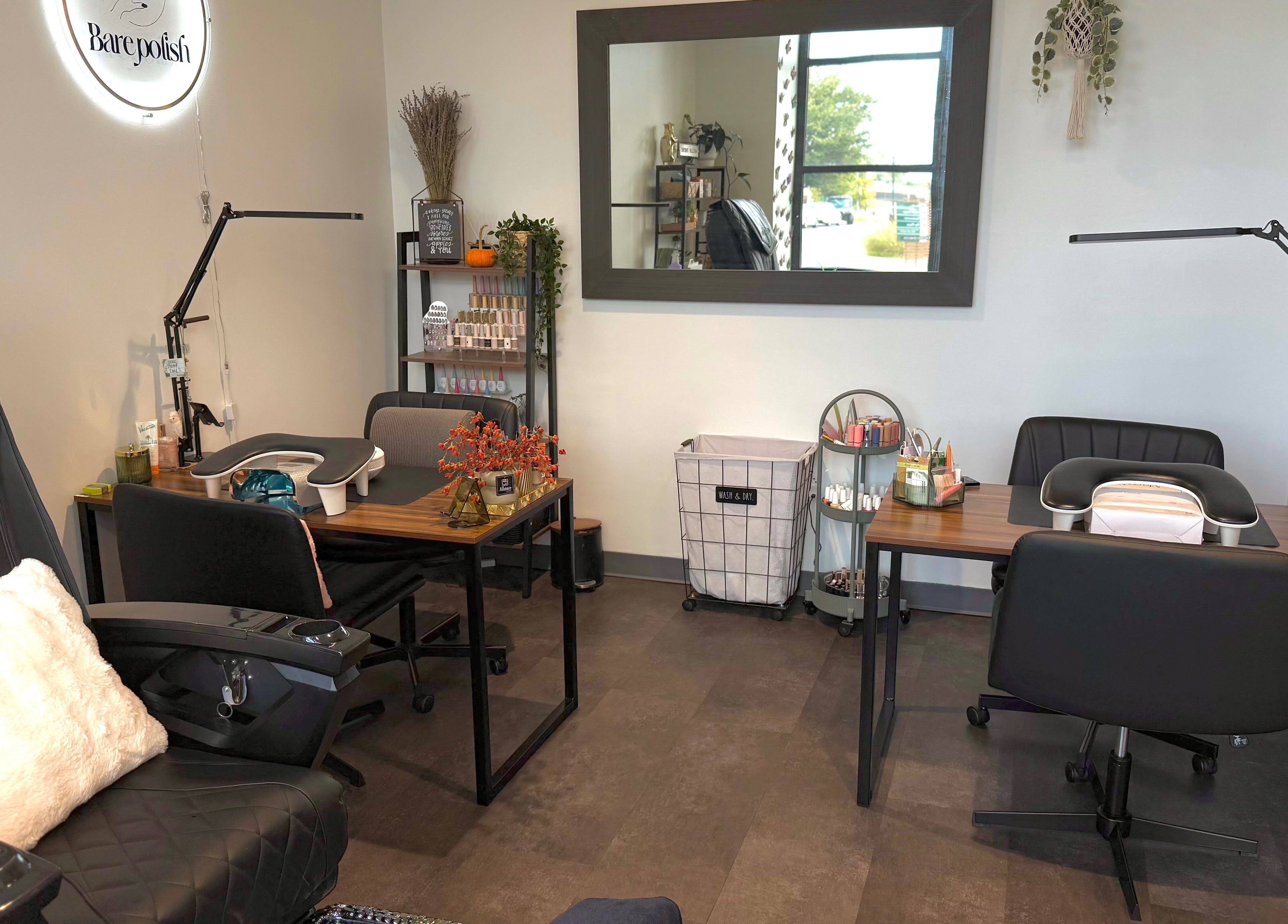 Stylish salon setup at Barepolish, Sterling, Virginia, US with modern decor and comfortable seating.